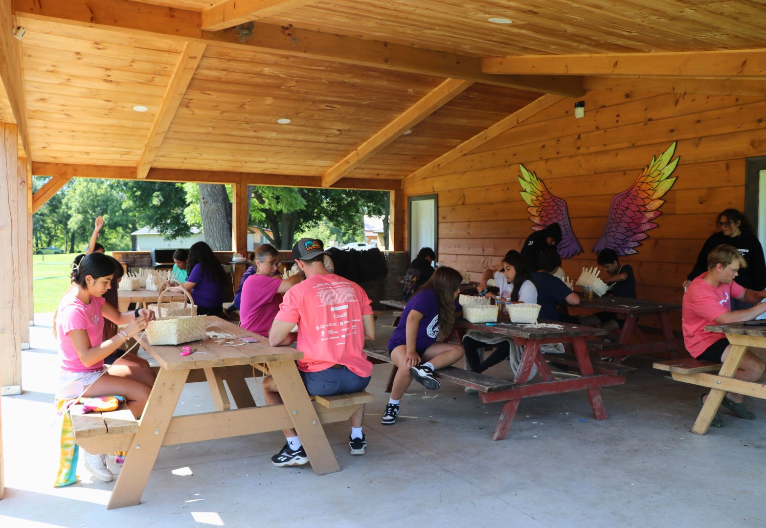 Land Camp students making baskets