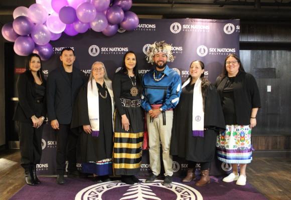 group of graduates posing for picture