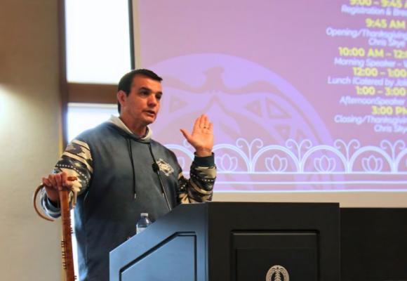 Man standing at podium
