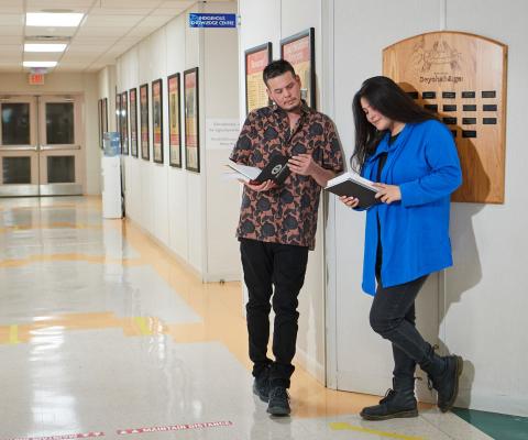 Two students in hallway