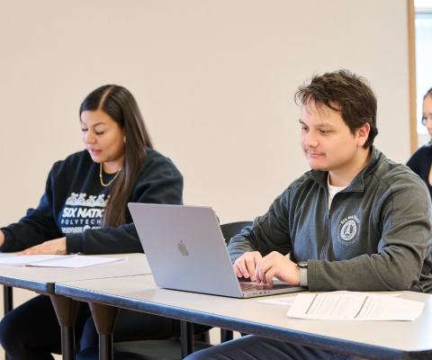 two students working at a table