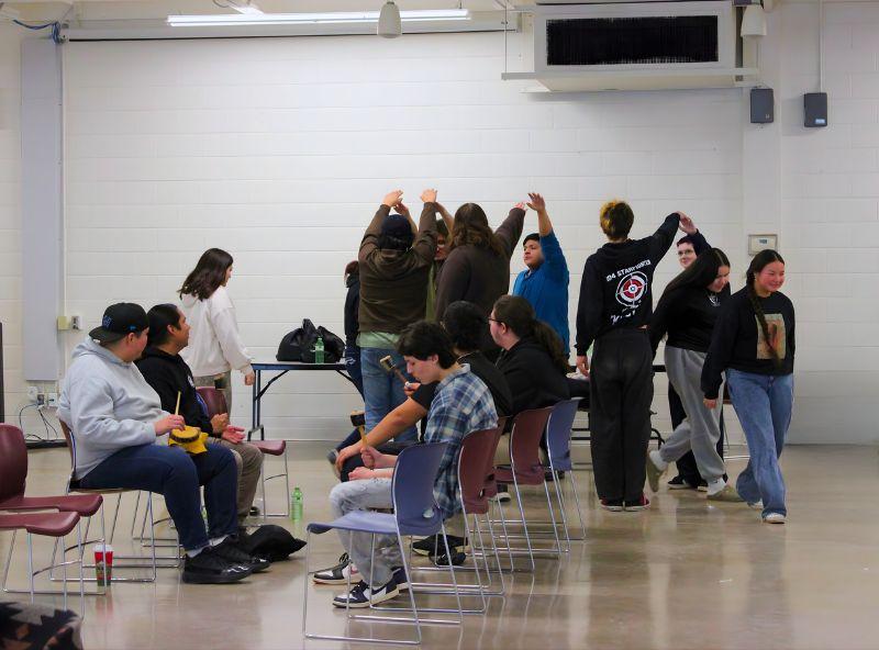 students dancing and singing