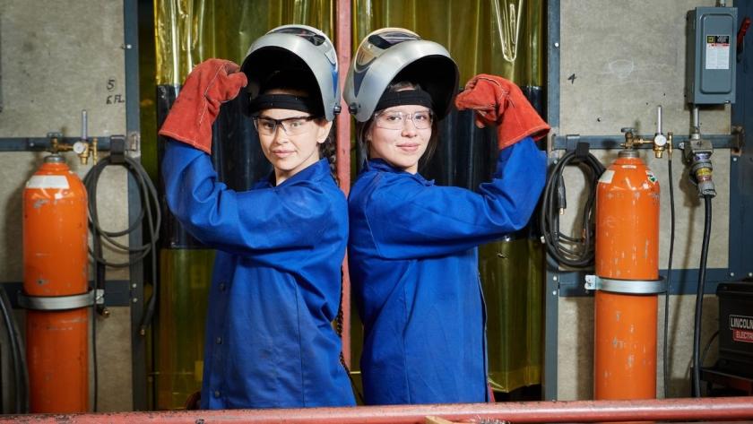 Women Welders back to back