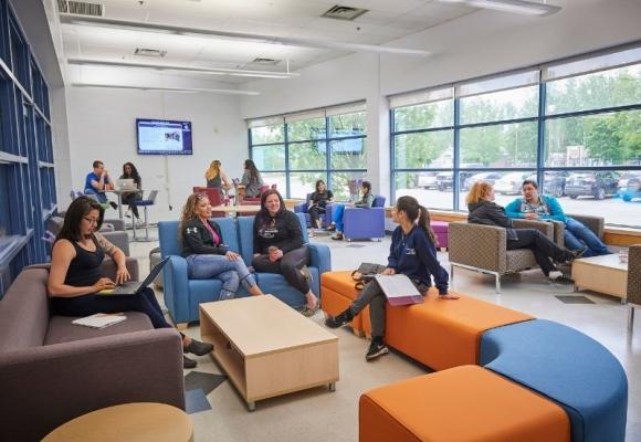 students seated in a lounge area